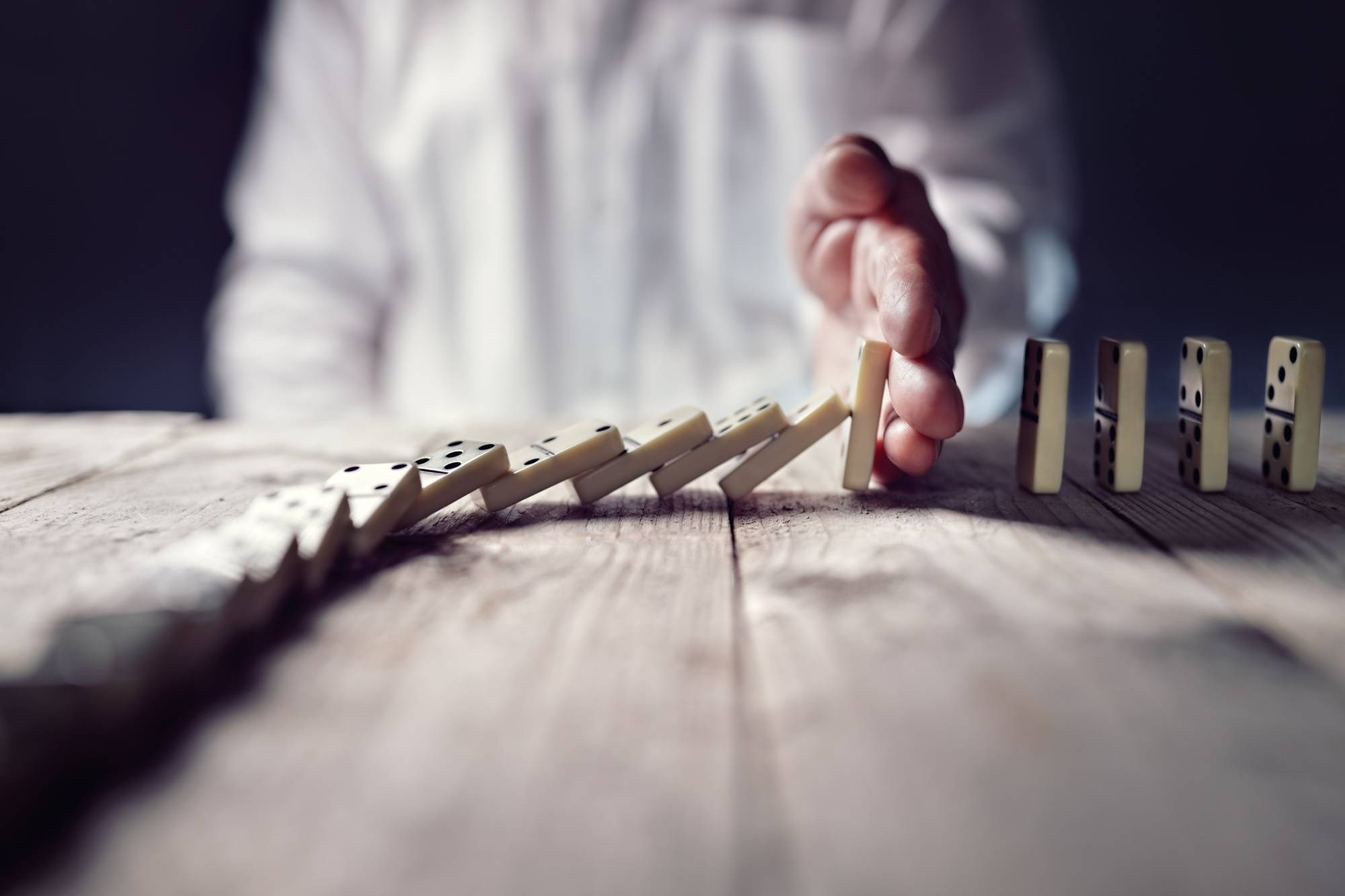 Stop the domino effect concept for business solution and interve